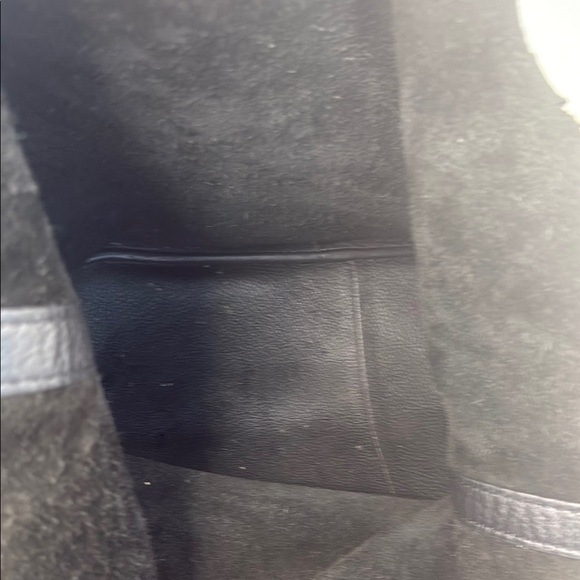 The image shows a Michael Kors Colgate Reversible Grab Bag in black. - Picture 7 of 11